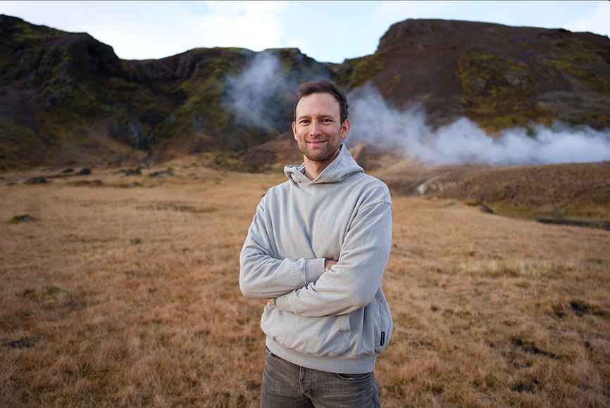 A man standing in a field with steam coming out of his ears. A man standing in a field with steam coming out of his ears.