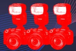 Three canon flashes on a blue background.