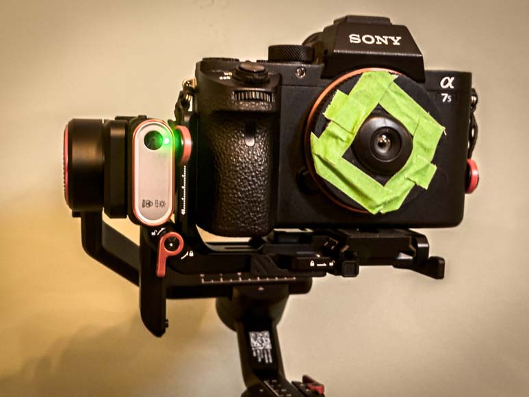 A sony a7ii camera on a gimbal.
