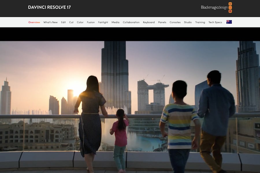 a group of people standing on top of a building.