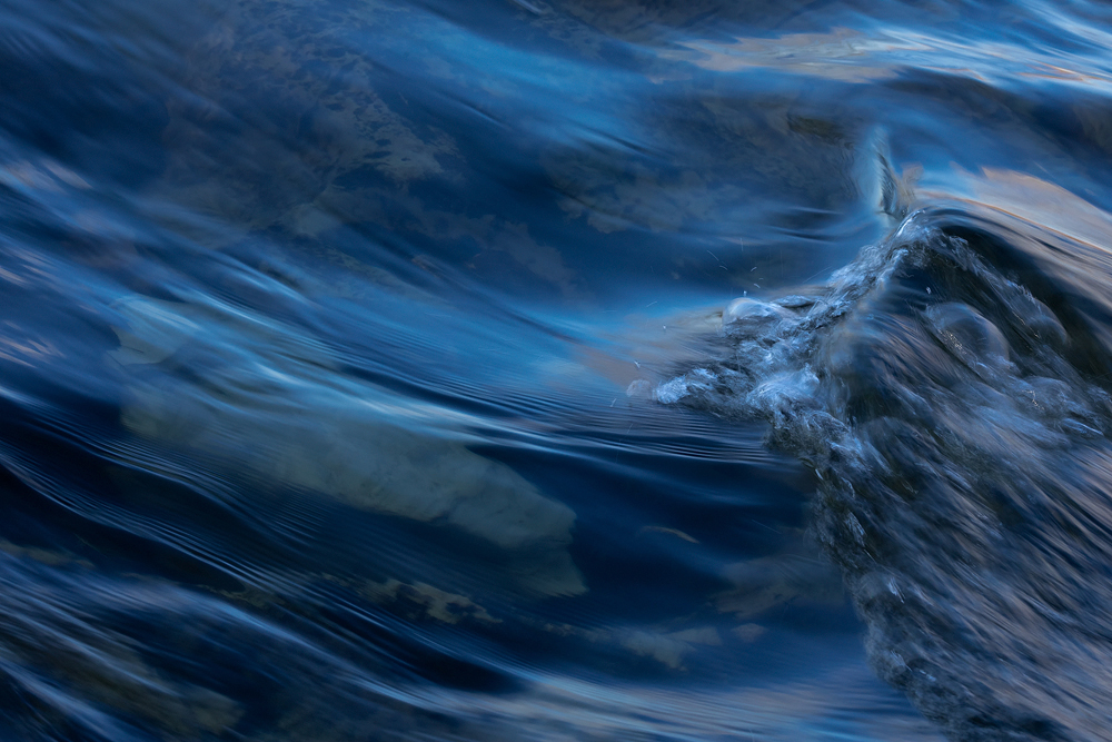 Flowing blue water.