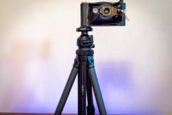 A tripod with a camera on top of it.