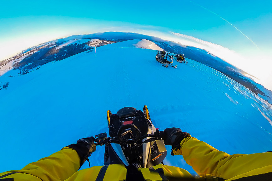 riding snow mobile