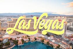 An aerial view of las vegas with the word las written in yellow.