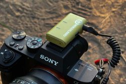 a camera with a microphone receiver attached to it.