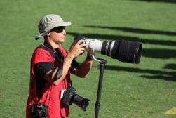 A man taking a picture with a camera.