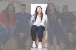 A group of people sitting on a bench.