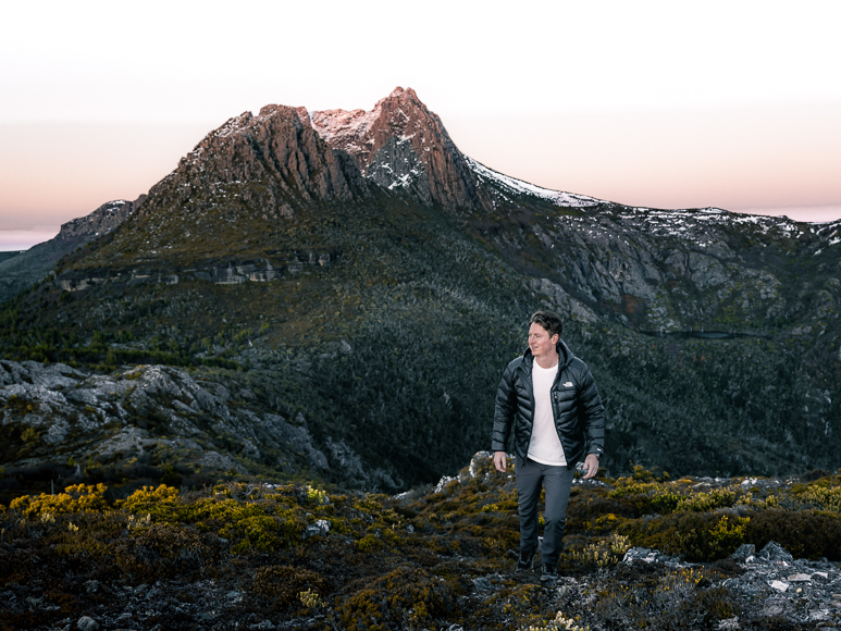 A man walking on a mountain.