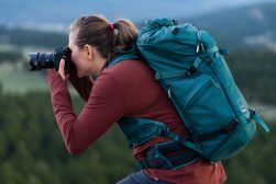a woman taking a picture with a camera.