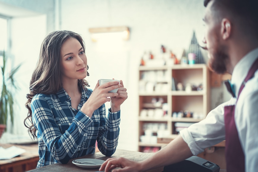 Woman drinking coffee.