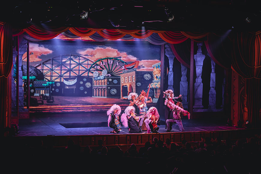A group of people on stage on a stage.