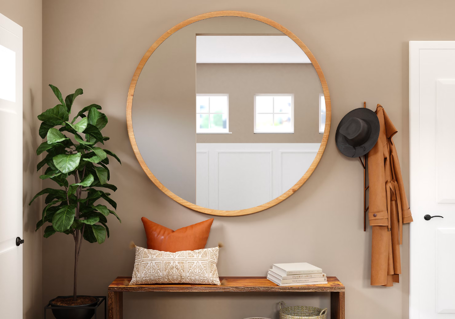 A hallway with a bench and a mirror. A hallway with a bench and a mirror.